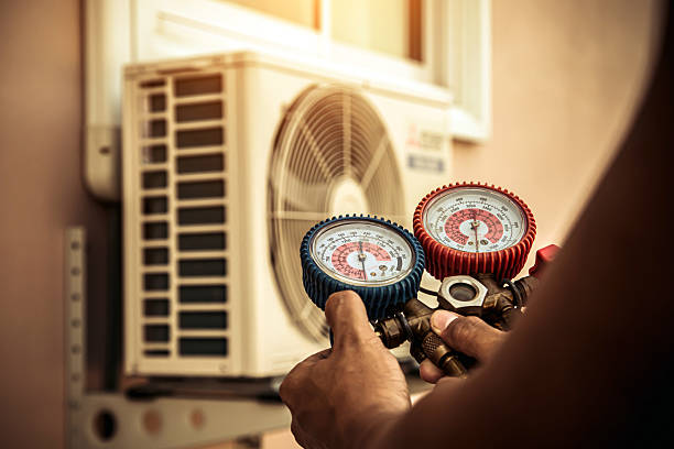 Professional Air Conditioning Service technician working in Terrace Park, OH